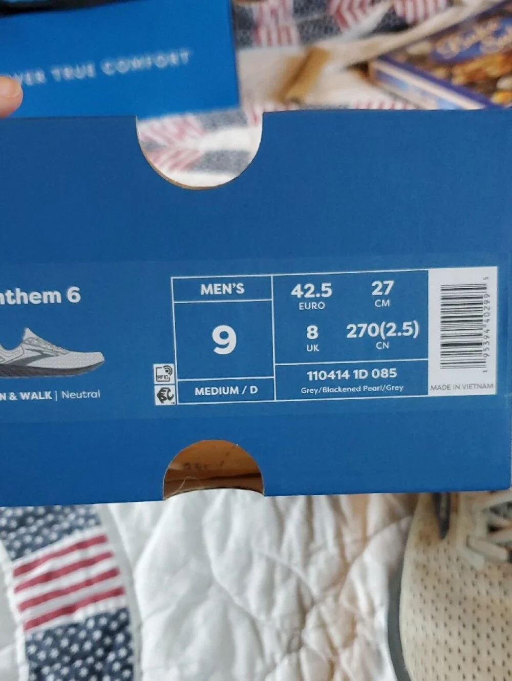 Brooks beige and white running shoes